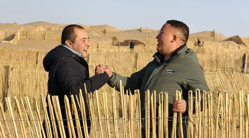 China's largest desert fully encircled with green belt